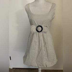 Sleeveless polka dot babydoll blouse